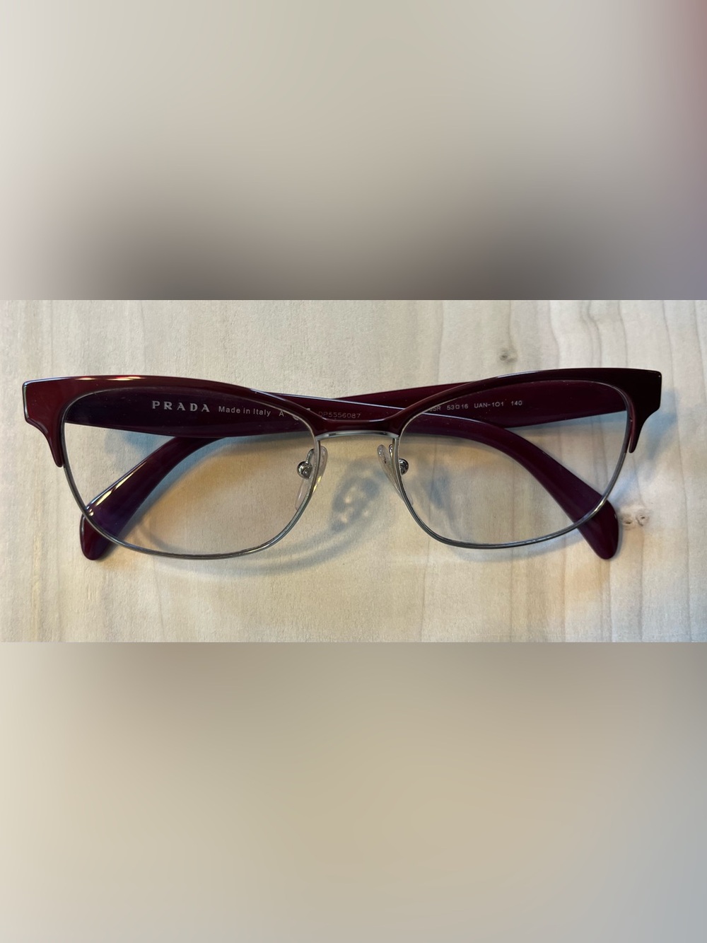 Prada Women's Eyeglass frames in Burgundy and gold